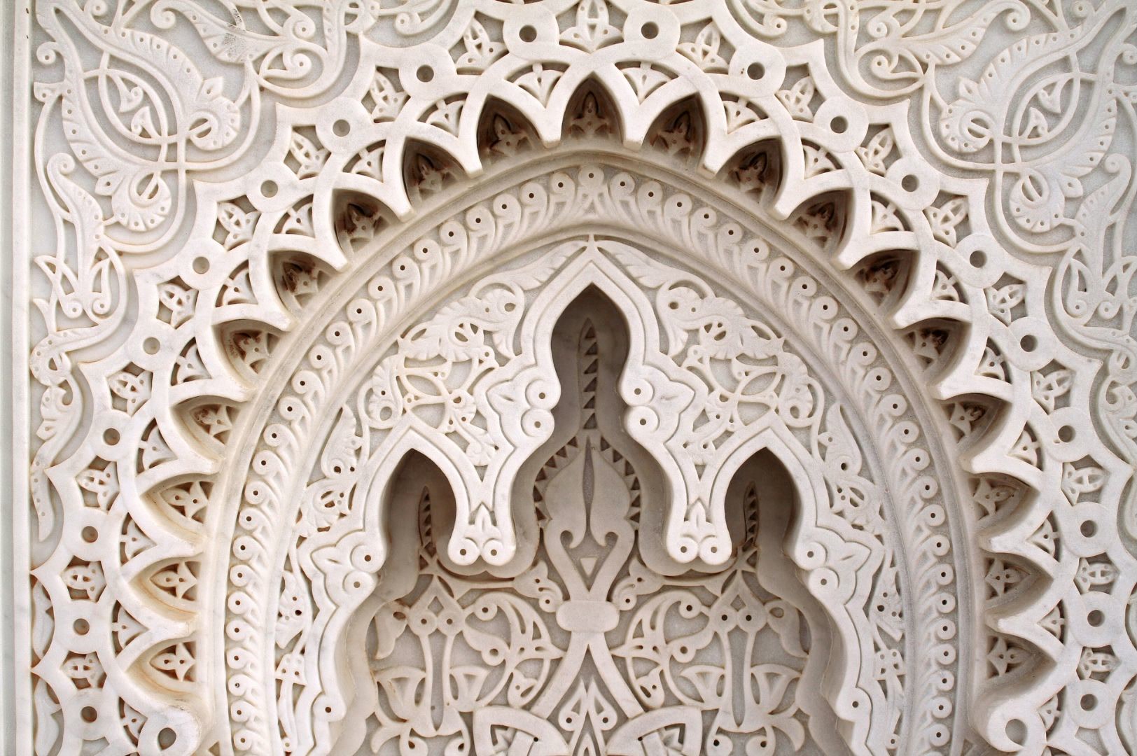 Hand-carved plaster arch