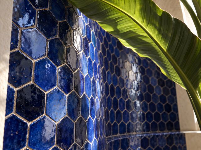 Cobalt zellige hexagons in a niche