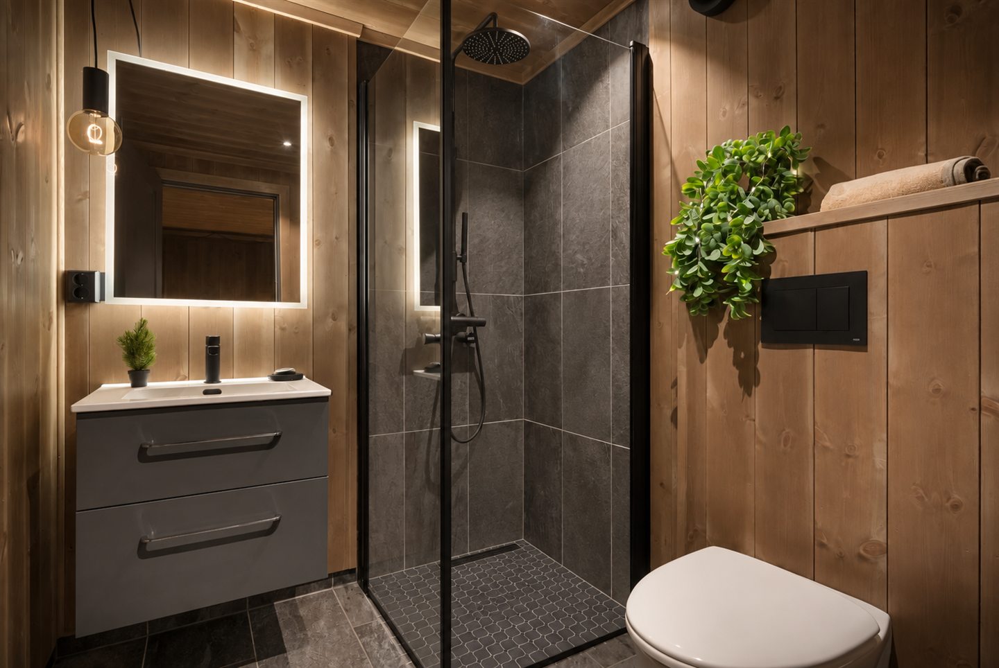 Douche aux finitions sombres